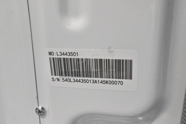 Barcode and label on KoolMore FLW-3CWH washing machine, showing MO: L3443501 and S/N: 540L34435013A145K00070.