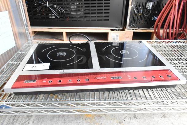 2023 Avantco 177IC18DB stainless steel 2-burner induction range, countertop model, 120V, visible surface damage.