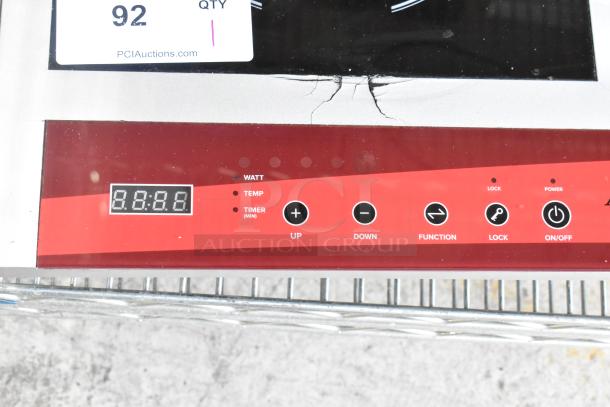 2023 Avantco 177IC18DB 2 Burner Induction Range, stainless steel. Features digital controls, visible surface crack. 120V, 1 phase.