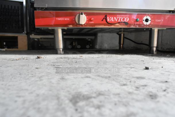 Avantco 177CO28M stainless steel countertop convection oven, electric, 208/240V, 1 phase, timer and temperature controls.