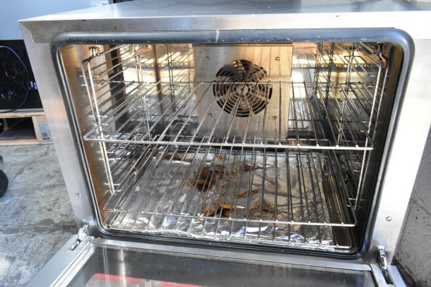 Avantco 177CO28M stainless steel countertop convection oven, half size, electric, interior racks, 208/240V, 1 phase.