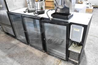 Beverage Air BB72G metal commercial cooler; 3 glass doors, back bar design, 115V/1PH, visible wiring, used condition.