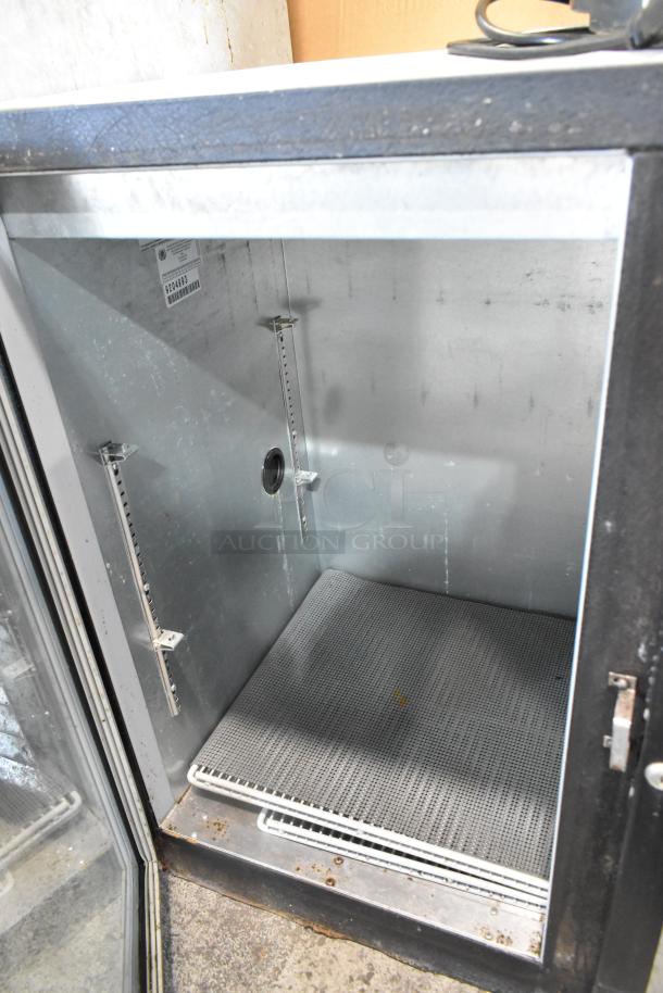 Beverage Air BB72G metal commercial 3-door back bar cooler merchandiser, empty interior, minor wear visible.