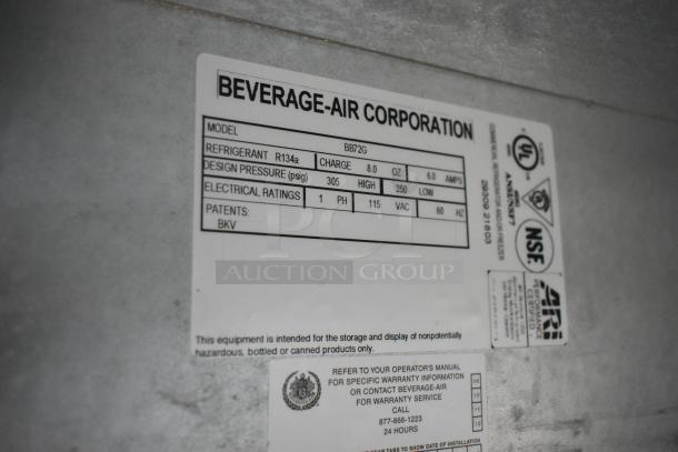 Beverage Air BB72G commercial 3-door back bar cooler tag displaying model, refrigerant R134a, and electrical ratings (115 volts, 1 phase).
