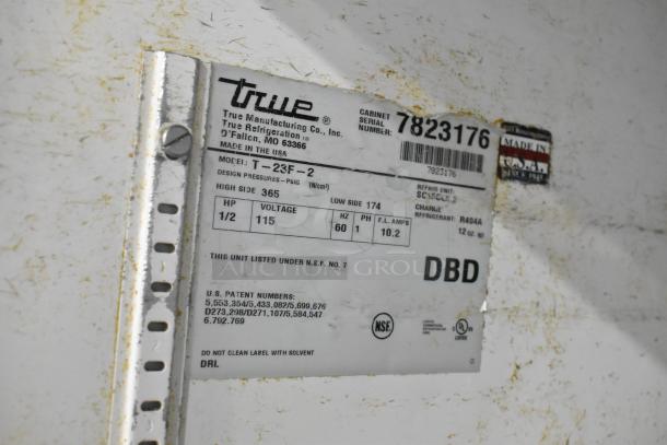 Label on True T-23F-2 freezer, model info, NSF listed, 115 volts, 1 phase, refrigerant R404A, serial number 7823176.