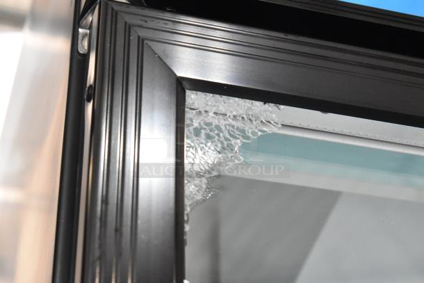 Avantco 178GDC40HCB refrigerator, scratch and dent, broken corner glass; black swing door with LED lighting.