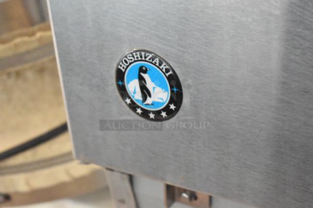 Hoshizaki F-330BAJ ice machine, stainless steel, self-contained undercounter design, 115 volts, logo visible.
