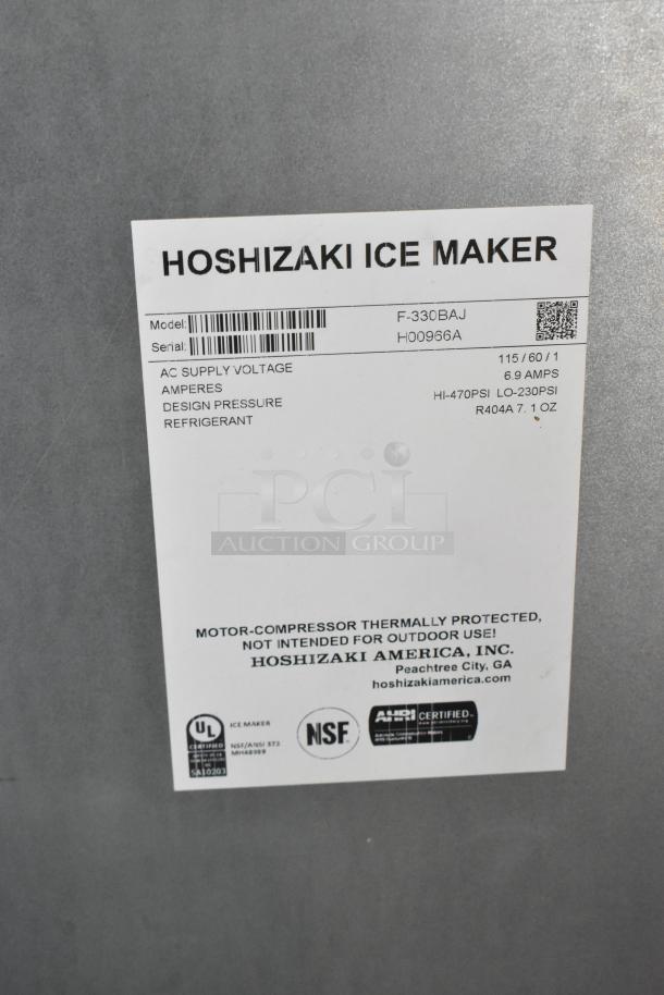 Hoshizaki F-330BAJ ice machine label showing model, voltage, and certification logos.