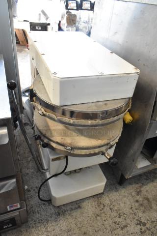 Spizza Metal Commercial Countertop Dough Press, 220V, 1 Phase. Used condition with visible wear. Sturdy handles and power cable attached.