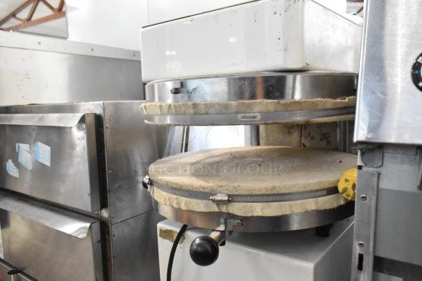 Spizza Metal Commercial Countertop Dough Press, 220V, 1 Phase, with visible wear, model Spizza.