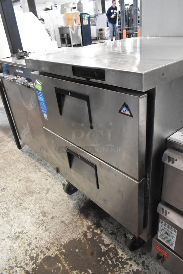 Everest stainless steel 2-drawer undercounter cooler on casters, 115V, 1 phase, showing wear. Features Everest logo.
