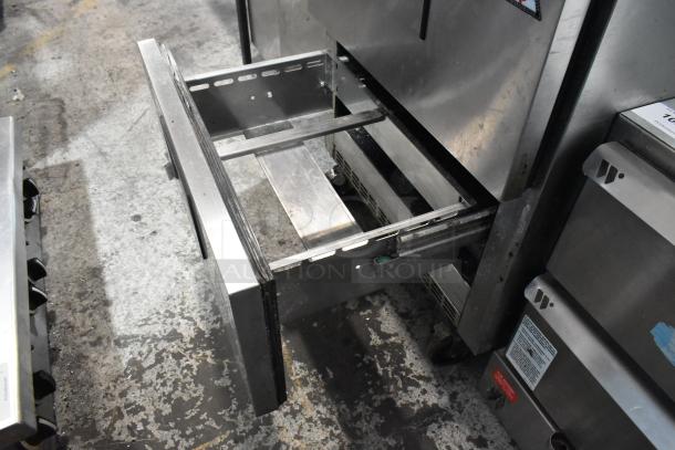 Everest stainless steel commercial 2-drawer undercounter cooler with open drawer, on casters, 115 volts, 1 phase.