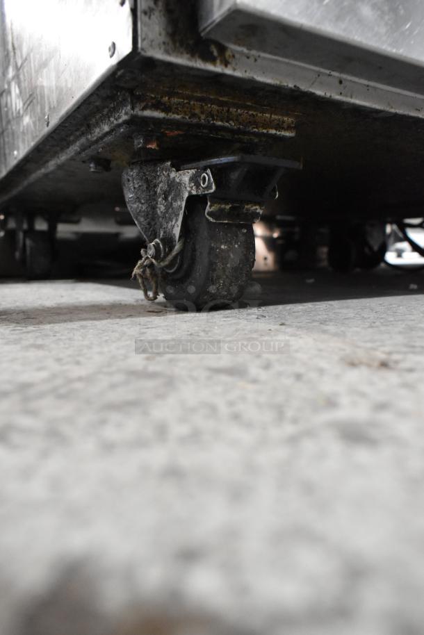 2017 Alto Shaam 750-CTUS stainless steel 2-door heated holding cabinet on casters, showing signs of wear.