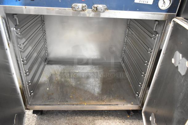 2017 Alto Shaam 750-CTUS stainless steel undercounter heated holding cabinet, 2 doors, commercial casters, 120V, interior visible.