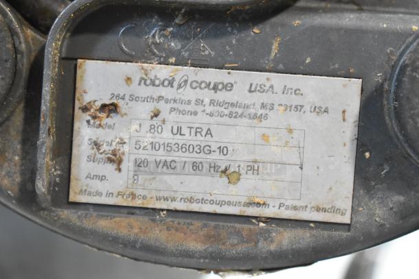 Robot Coupe J 80 Ultra juicer label showing model and voltage. One of two juicers, 1 missing top, 120 volts, 1 phase.