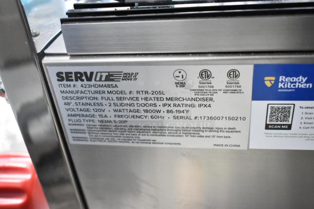 Alt text: ServIt 423HDM48SA heated display case label, showing specs: 48" model, 120V, IPX4, stainless, with broken glass.