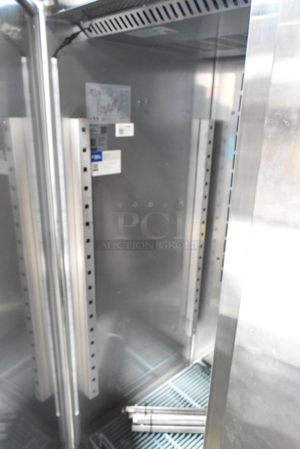 Brand new Avantco 178Z2FHC stainless steel commercial 2-door reach-in freezer, poly-coated racks, 115 volts, 1 phase.