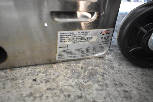 Brand new Avantco 177EG48N 48" stainless steel electric countertop griddle with scratch and dent, 208/240V, 1 phase.