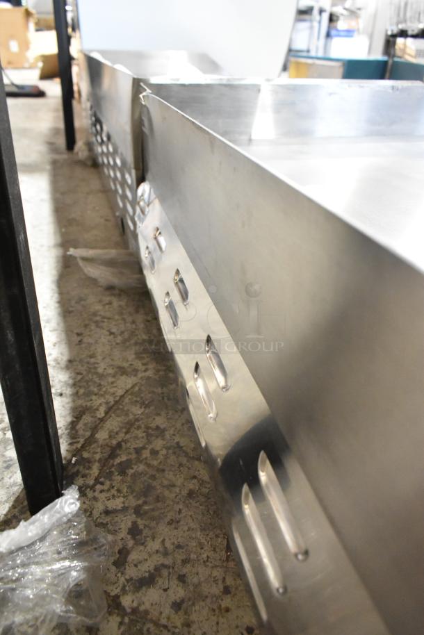 Brand new Avantco 177EG48N 48" stainless steel electric griddle with minor dents on surface. 208/240 Volts, 1 Phase.