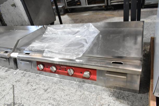 Brand new Avantco 177EG48N stainless steel 48" electric countertop griddle, minor scratches, 208/240 volts, 1 phase.