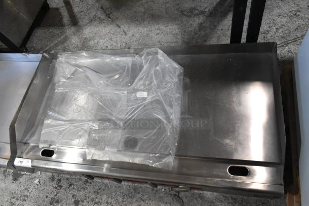 Brand new Avantco 177EG48N 48" stainless steel electric countertop griddle. Scratch and dent. 208/240V, 1 phase.