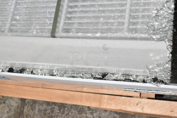 Brand new Avantco 178DLC82HCW 82" deli case with curved glass. Visible glass damage. 115V, 1 Phase. Model: 178DLC82HCW.