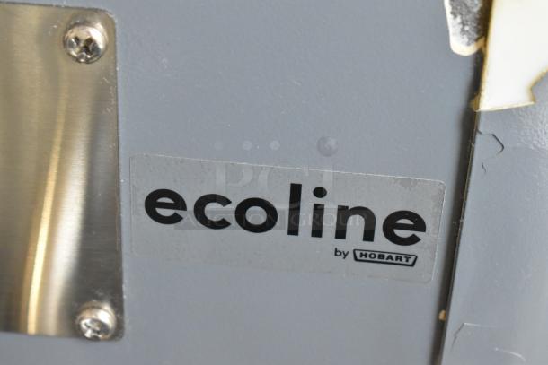 Hobart Ecoline EMM10 label on a 2024 countertop dough mixer, showcasing brand and model.