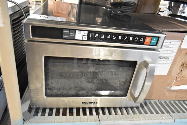 Solwave stainless steel commercial microwave, brand new, scratch and dent, with user-friendly controls and digital display.
