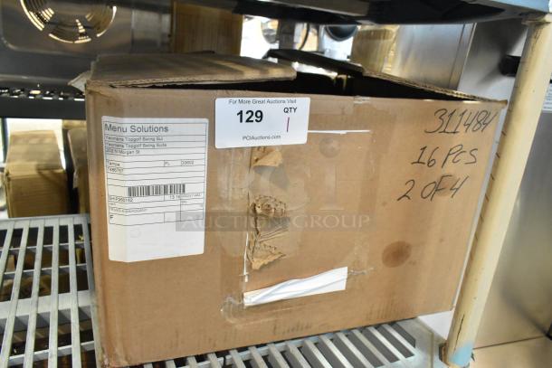 Box of Menu Solutions wooden countertop menu holders, brand new, scratched, and dented, 16 pieces, box labeled.