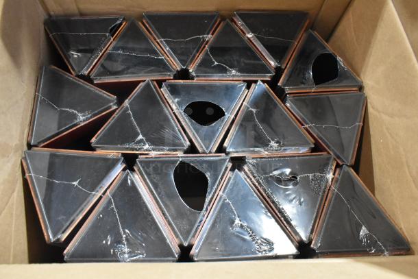 Box of wooden countertop menu holders, triangular, brand new with visible scratch and dent damage, packaged in plastic wrap.