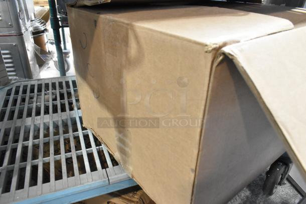 Box with minor dents containing new Menu Solutions wooden countertop menu holders.