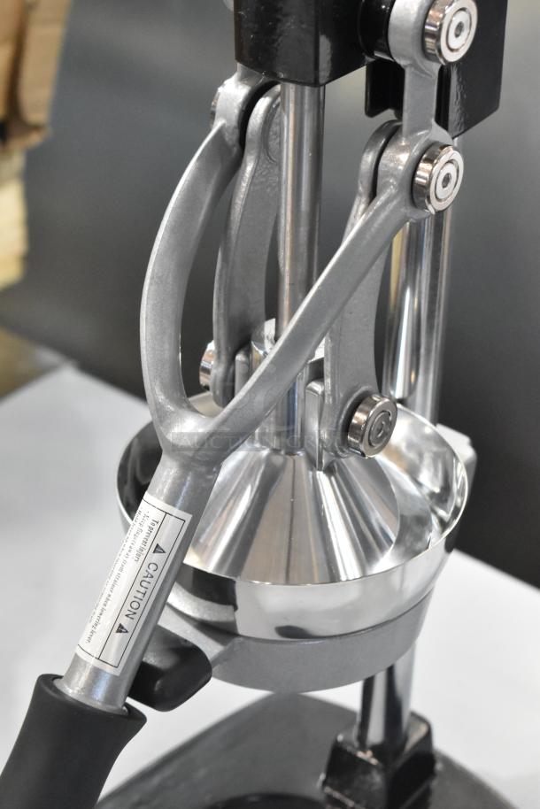BRAND NEW Garde 5015567 manual citrus juicer; metal construction; countertop style; minor scratches and dents.