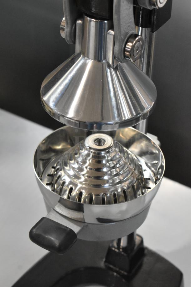 BRAND NEW Garde 5015567 metal countertop manual citrus juicer. Minor scratches and dents. Polished finish, sturdy handle.
