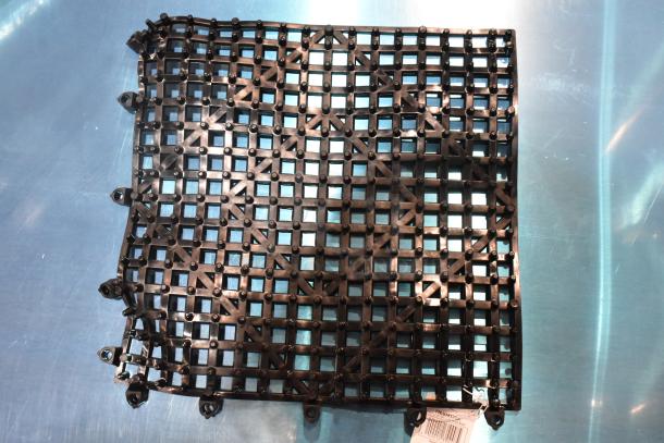 2 new scratch and dent Choice 176BM12BK 12" x 12" black interlocking bar mats, in package, grid design, sturdy plastic.