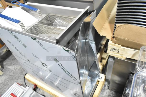 Brand new Imperial IFS-40-E stainless steel 40 lb. electric fryer with 2 baskets, scratch and dent, 208V, 1 phase.