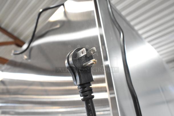 Brand new Avantco 178Z2RGHC 2 Door Stainless Steel Reach In Cooler, 115V, scratch and dent condition, power cord visible.
