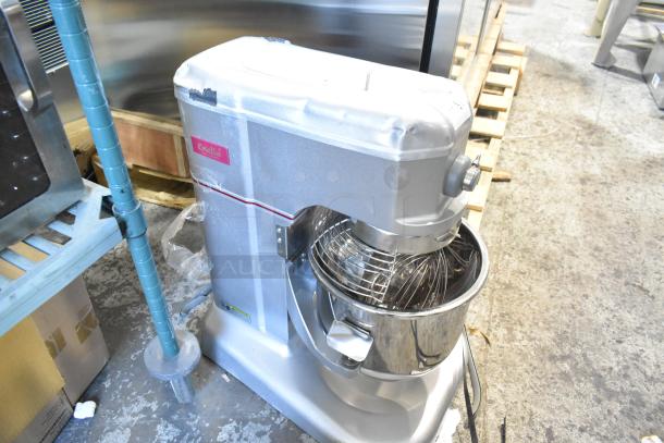 Brand new Estella 348EMIX12G metal commercial 12 qt. mixer, includes bowl guard, whisk, operates at 120V, minor scratches.