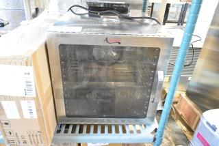 Avantco 177LT87 food dehydrator, 12 trays, stainless steel, glass door, scratch and dent, 120V, 1 phase, new condition.