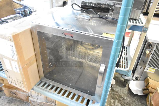 Brand new Avantco 177LT87 stainless steel food dehydrator, 12 trays, glass door, 120 volts, minor scratches.