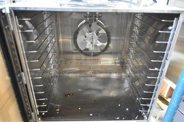 Brand new Avantco 177LT87 12 Tray Stainless Steel Food Dehydrator with glass door. Some visible scratches and dents. 120V, 1 Phase.