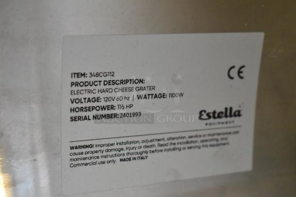 Alt text: Estella 348CG112 stainless steel electric hard cheese grater label showing specs: 120V, 1100W, 1.5 HP. Made in Italy.