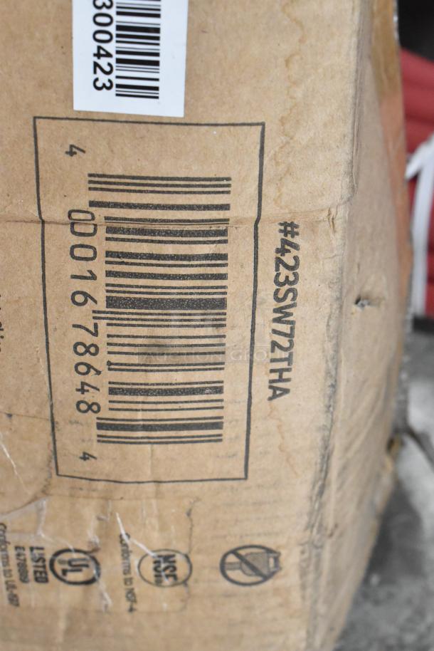 Cardboard box labeled #423SW72THA, showing barcode and certifications. Box likely contains the ServIt 72" Strip Warmer.