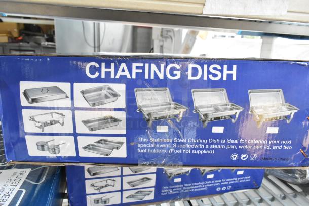 Brand new chafing dish set, scratch and dent condition. Includes steam pan, water pan, lid, and fuel holders. Made in China.