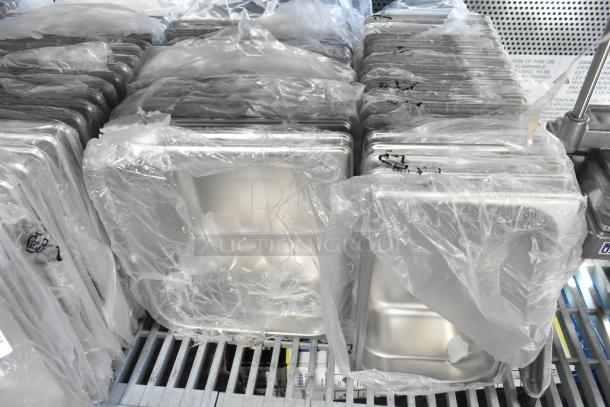75 new scratch and dent stainless steel drop-in bins in plastic wrap. Bulk auction, 75 times bid value.