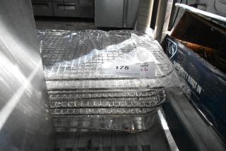 Six new metal cooling racks, scratch and dent condition, wrapped in plastic. Auction label indicating quantity of six.