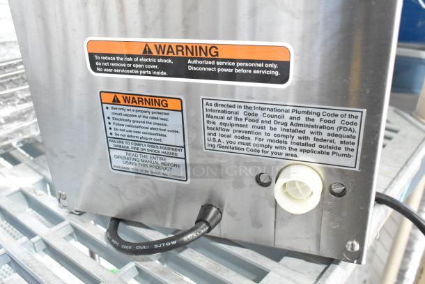 BRAND NEW Bunn My Cafe AutoPOD Auto Eject Pod Brewer, stainless steel body, warning labels, scratch and dent condition.