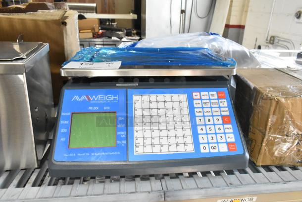 Brand new AvaWeigh 334PCSP60 thermal label printing price computing scale, visible scratch and dent, protective film on tray.