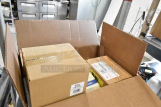 Box of 6 brand new scratch and dent items including Solwave door assembly and Choice squeeze bottle holder. Includes tags.