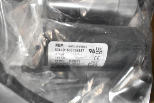 Packaged NGM capacitor with label: "Made in Mexico, 60A4D160340NBET, 374µF, 165Vac, 50/60Hz, Lot: 6008815, Nov 09, 2024."