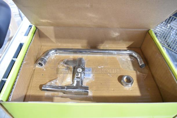 Brand new T&S Equip Faucet with minor scratches. Includes faucet body and spout in original box. SCP label visible.